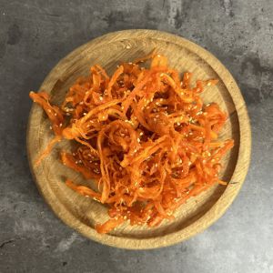 Кальмар з кунжутом 100гр.