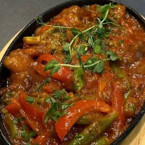 Гаряча сковорода зі свининою