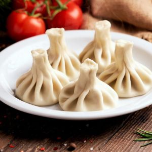 Хінкалі з телятиною та зеленню