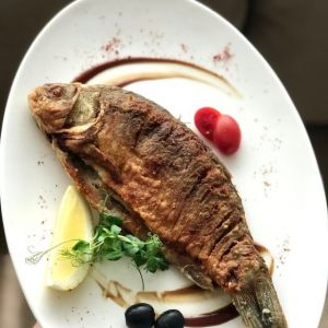 Доставка Карась смажений (подається с часником) (100 гр) из Zeytun Карась смажений (подається с часником) (100 гр)